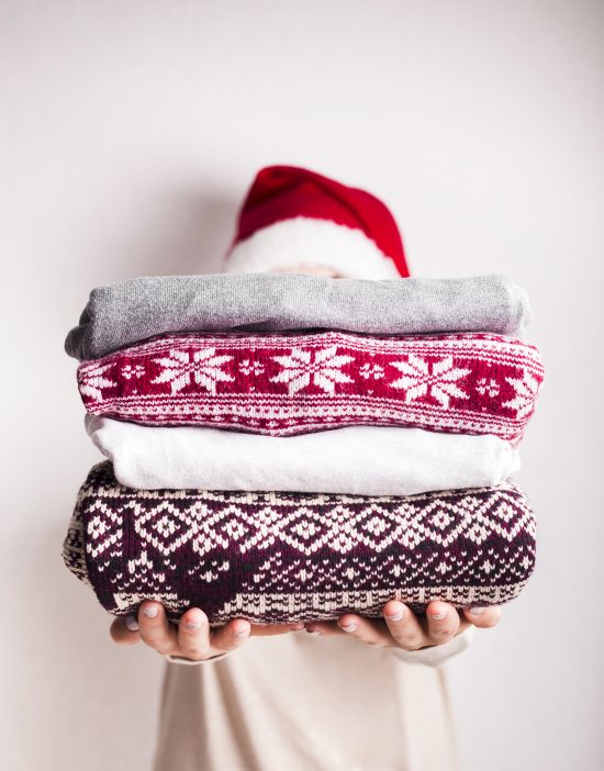 Christmas Jumpers with traditional patterns. Freshly washed with Distinctive washing powder